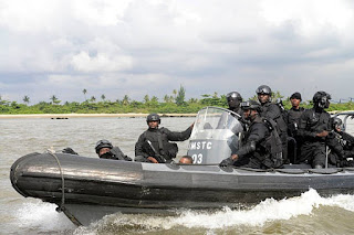 Photograph: Nigeria Navy special force  Patrol in water. Source: gettyimage